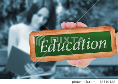 Education against pretty student studying outside on campus 18140488