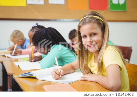 Pupil smiling at the camera Pupil smiling at the camera 18141408