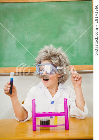 Student dressed up as einstein using a chemistry set Student dressed up as einstein using a chemistry set 18141966