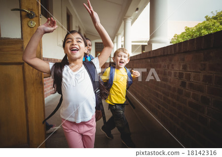 Happy pupils leaving the classroom Happy pupils leaving the classroom 18142316