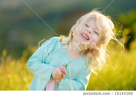 Adorable toddler girl on summer day Adorable toddler girl on summer day 18143160