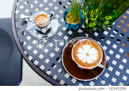 Coffee cup on table in cafe Coffee cup on table in cafe 18145299