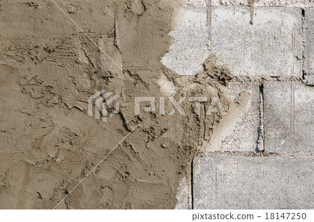 plasterer concrete on wall of house construction 18147250