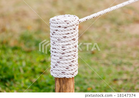 rope knot on wood in garden rope knot on wood in garden 18147374