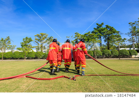 Firefighter fighting for fire attack training 18147484