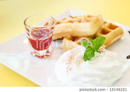Strawberry Waffle whipped Cream on yellow desk 18148281