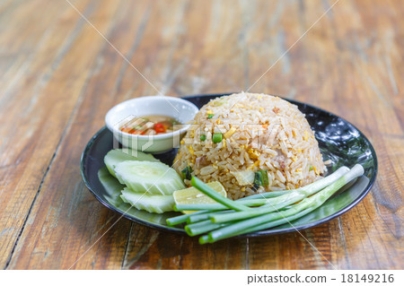 Thai fried rice on wooden desk Thai fried rice on wooden desk 18149216