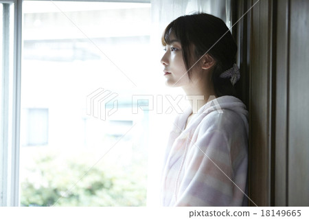 A woman in her room A woman in her room 18149665