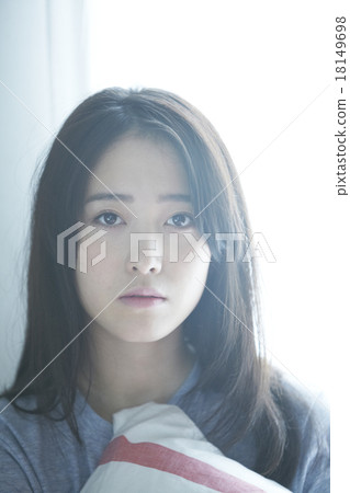 A woman in her room A woman in her room 18149698