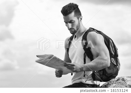 Black and white photo of a tourist with backpack Black and white photo of a tourist with backpack 18153124