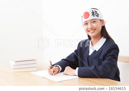 Smile girl studying for entrance exam 18154615