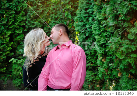 Young loving couple in the park 18155340