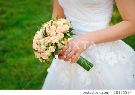 bouquet in the hands of the bride 18155554