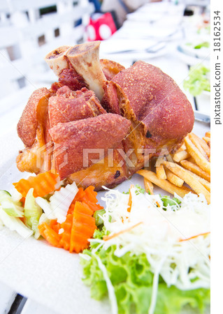 German BBQ pork knuckle  with french fries 18162534