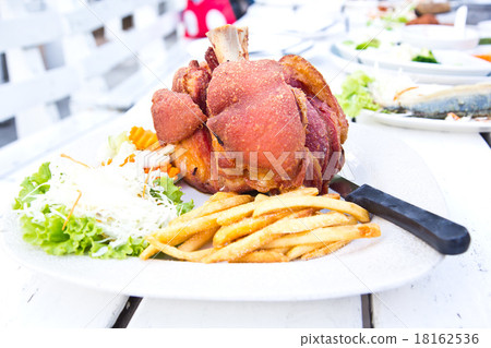 German BBQ pork knuckle  with french fries 18162536