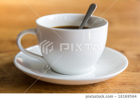 Coffee in white cup on wood table 18169564