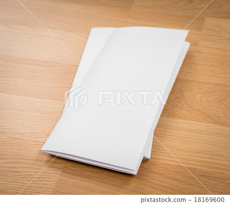 Trifold white template paper on wood texture 18169600
