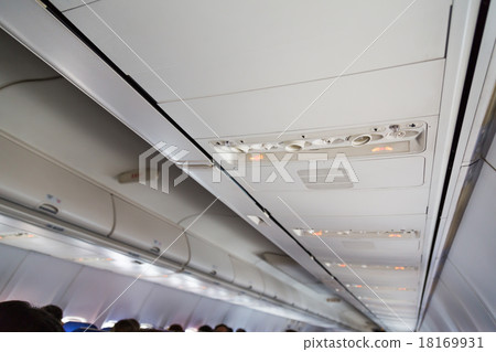 No smoking sign and seat belt sign on the airplane No smoking sign and seat belt sign on the airplane 18169931