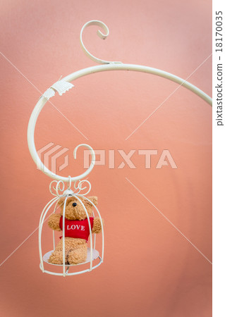 Bear doll in white bird cage Bear doll in white bird cage 18170035