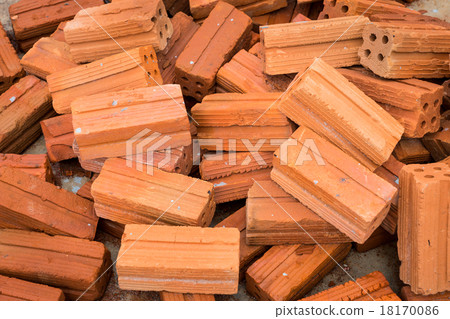 Stack of red bricks background 18170086