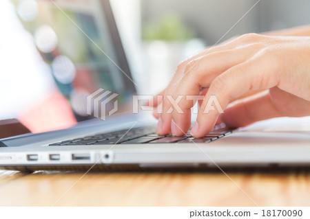 Closeup of business woman hand typing on laptop keyboard Closeup of business woman hand typing on laptop keyboard 18170090