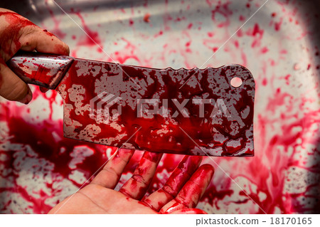 Hand hold bloody knife in a steel shell for halloween 18170165