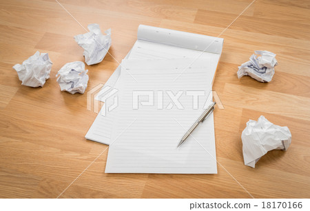 White note book paper with pencil and crumpled paper on a wooden White note book paper with pencil and crumpled paper on a wooden 18170166