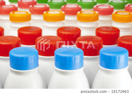 dairy products bottles with bright covers 18172663
