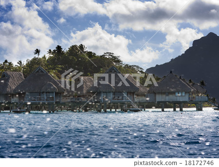 island with palm trees in the sea through splashes island with palm trees in the sea through splashes 18172746