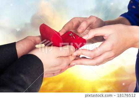 Young man makes a proposal his girlfriend Young man makes a proposal his girlfriend 18176512
