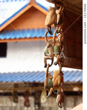 handcraft funny monkeys hanging at a souvenir shop handcraft funny monkeys hanging at a souvenir shop 18176666