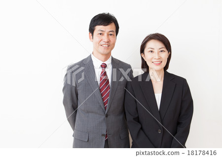 Male and female middle businessman 18178416