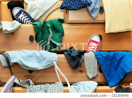 Scattered clothes and shoes Scattered clothes and shoes 18180646