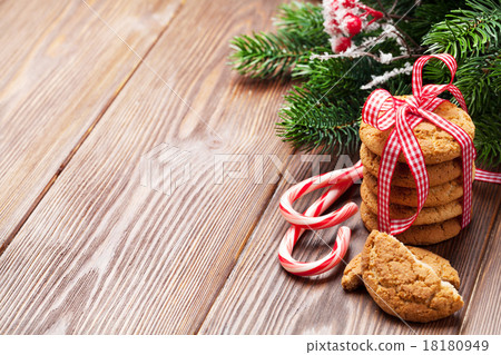 Christmas gingerbread cookies, candy cane and tree Christmas gingerbread cookies, candy cane and tree 18180949
