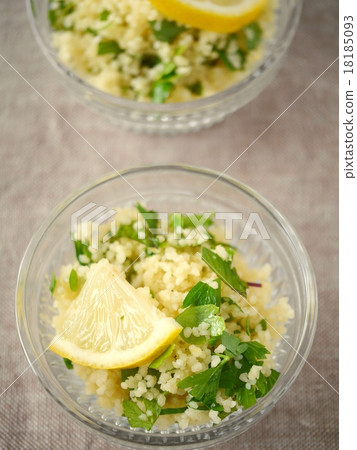 Green tablle glass cocot background brown (high angle) Green tablle glass cocot background brown (high angle) 18185093