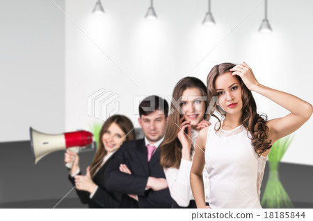 Several business people stand in the hall Several business people stand in the hall 18185844