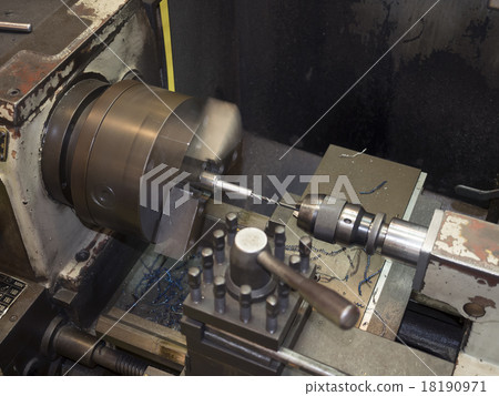 operator turning mold parts by manual lathe operator turning mold parts by manual lathe 18190971