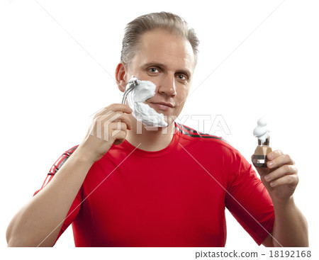 sports man has a shave- with the razor and a small sports man has a shave- with the razor and a small 18192168