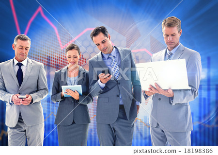 Composite image of business colleagues using their multimedia de 18198386