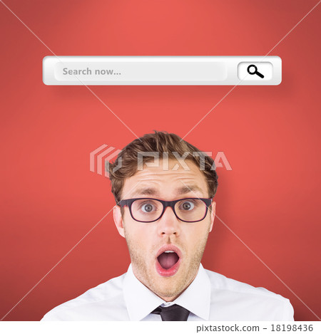 Composite image of geeky businessman looking at camera Composite image of geeky businessman looking at camera 18198436