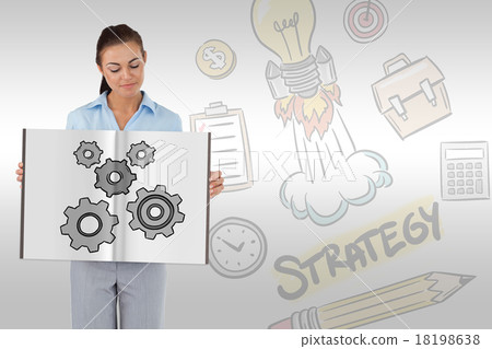 Composite image of pretty woman showing a book 18198638