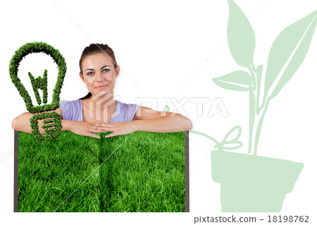 Composite image of woman with lawn book 18198762