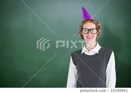 Composite image of geeky hipster wearing a party hat Composite image of geeky hipster wearing a party hat 18198941