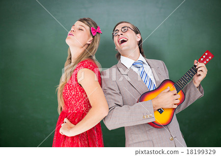 Composite image of hipster couple having fun together Composite image of hipster couple having fun together 18199329