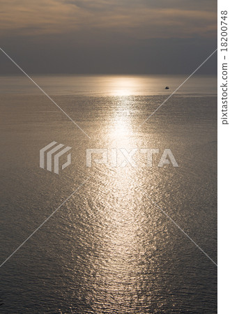 ship pass sea sunset and sunlight reflection 18200748