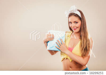 Retro pin up girl shopping 18209251