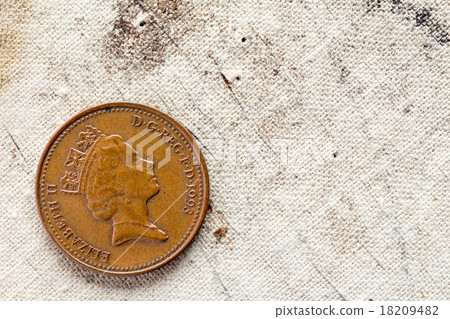 One penny on canvas background 18209482