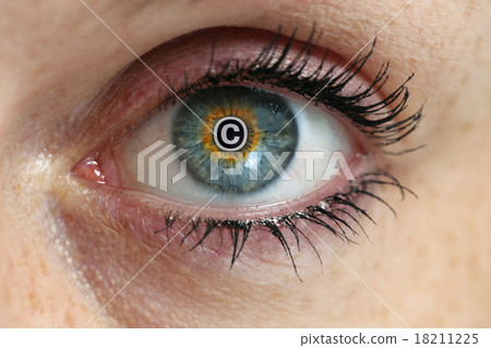 Eye with copyright sign in the pupil concept 18211225
