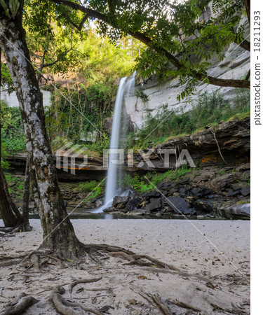 Deep forest waterfall with sand beach Deep forest waterfall with sand beach 18211293