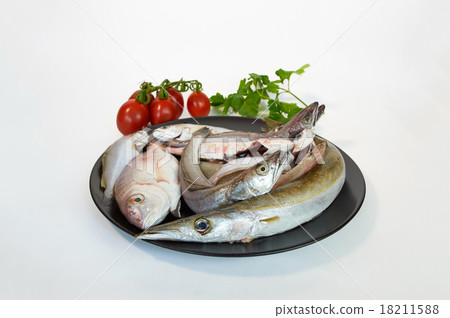 Fish assorted Mediterranean platter on black plate Fish assorted Mediterranean platter on black plate 18211588